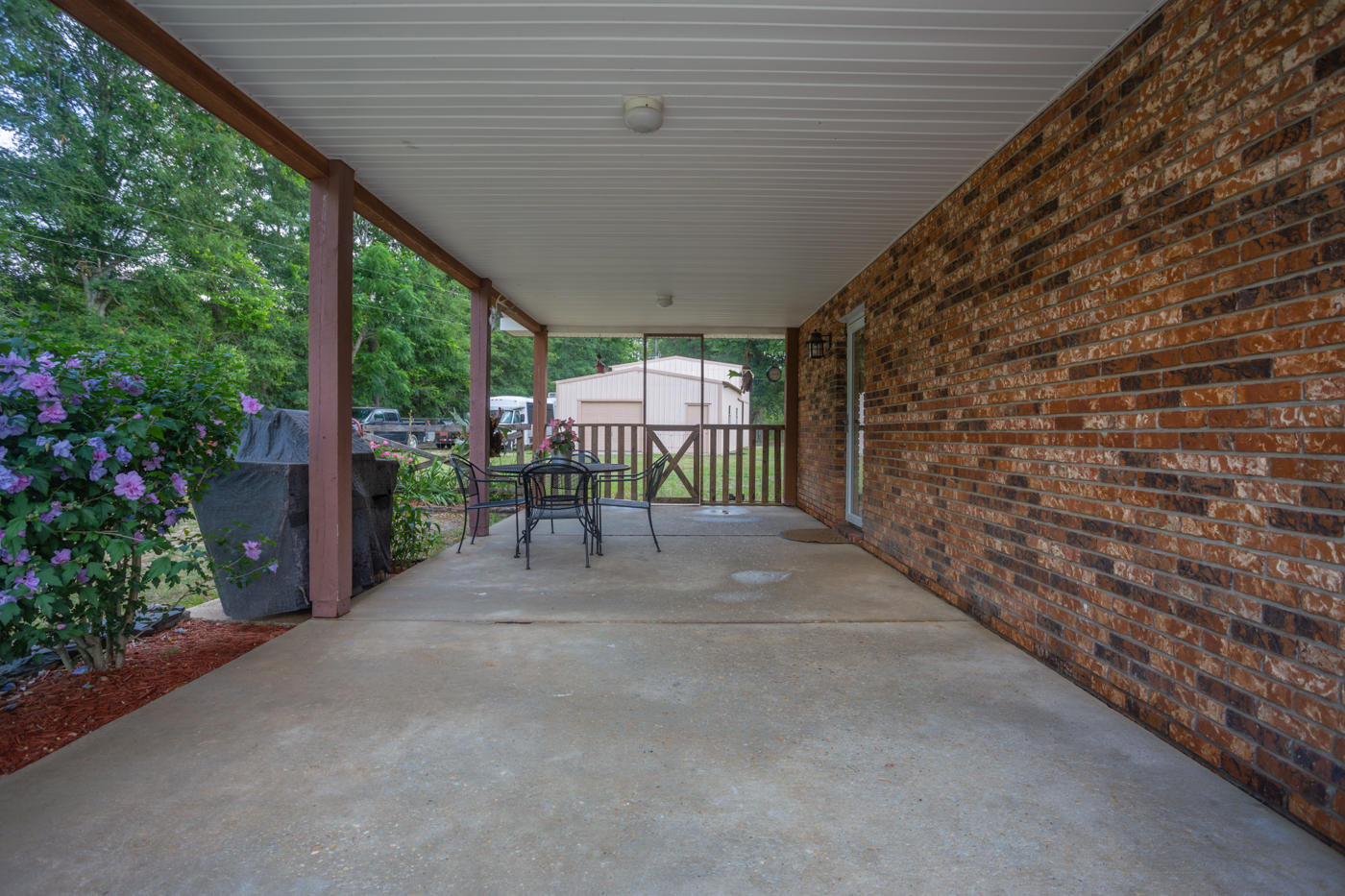 5621 Buckward Road Baker, FL 32531 - Photo 27 of 41 a view of a backyard with garden