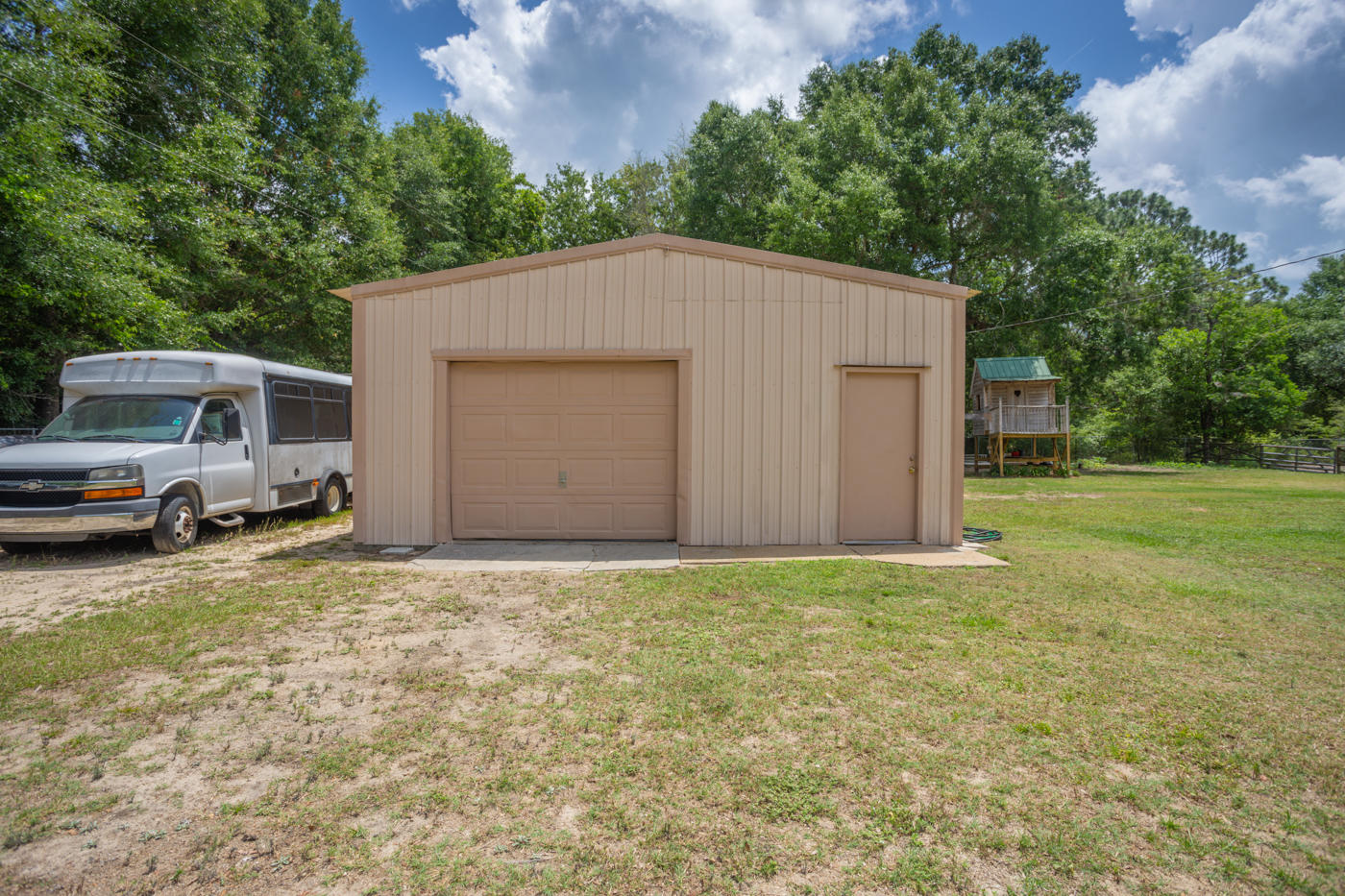 5621 Buckward Road Baker, FL 32531 - Photo 29 of 41 a view of a house with backyard