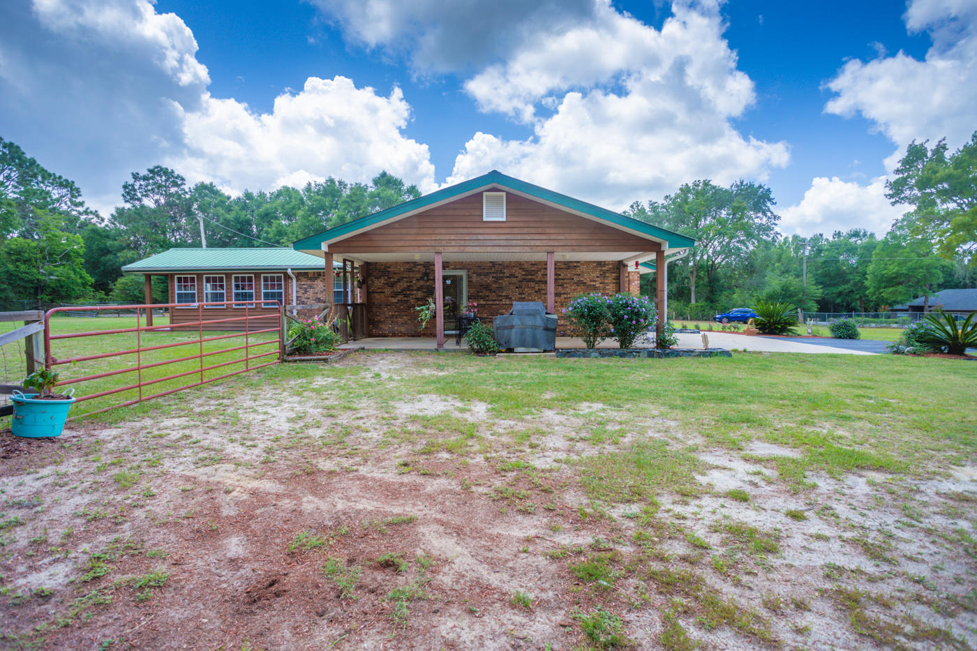 5621 Buckward Road Baker, FL 32531 - Photo 30 of 41 a view of a house with a yard