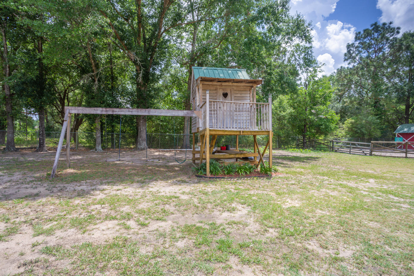 5621 Buckward Road Baker, FL 32531 - Photo 36 of 41 a view of a house with backyard and a tree