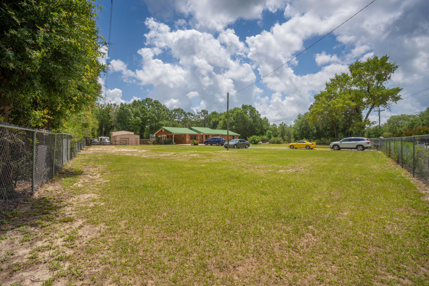 5621 Buckward Road Baker, FL 32531 - Photo 40 of 41 a view of a water with a big yard