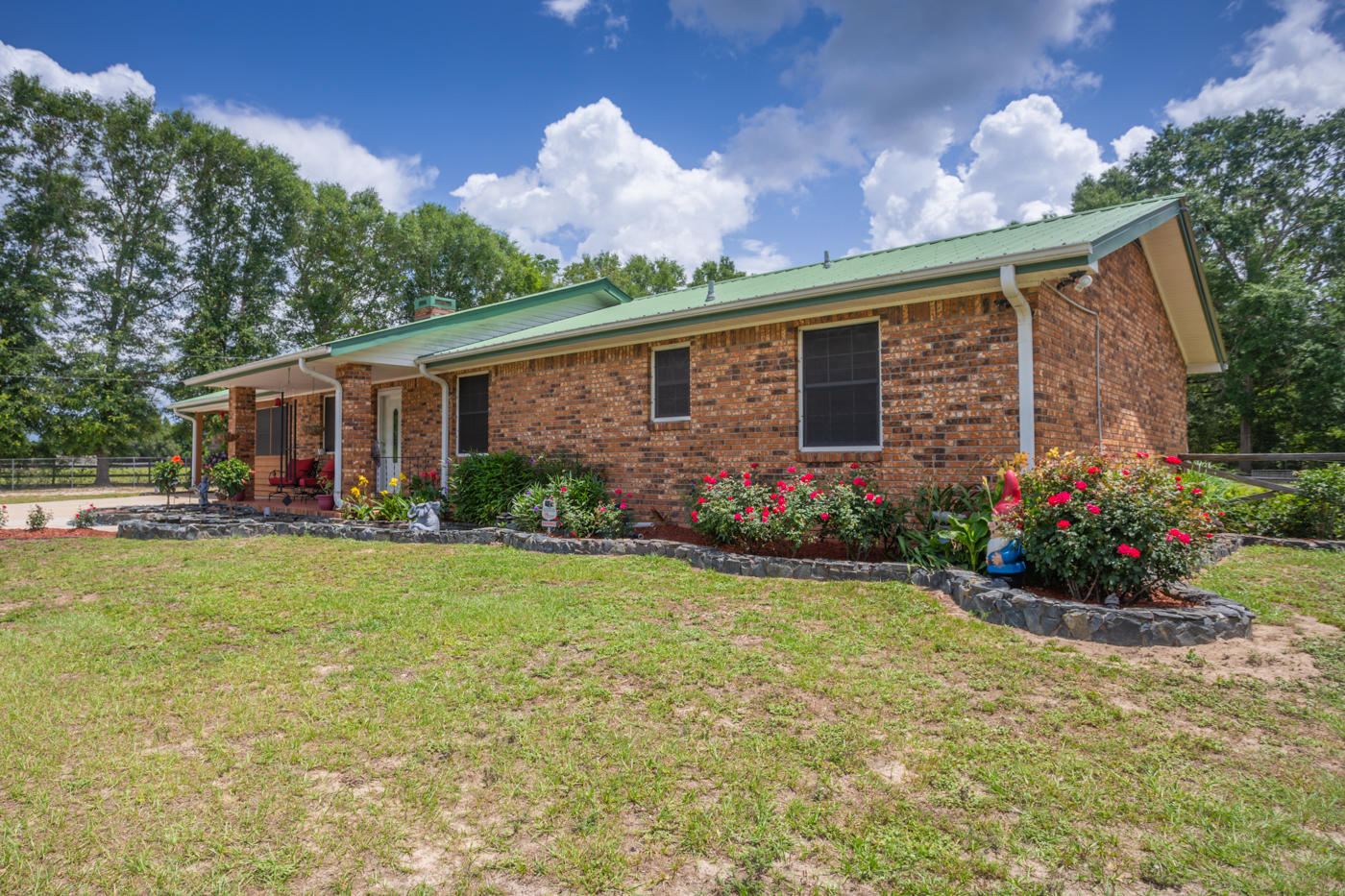 5621 Buckward Road Baker, FL 32531 - Photo 5 of 41 a front view of house with yard and green space