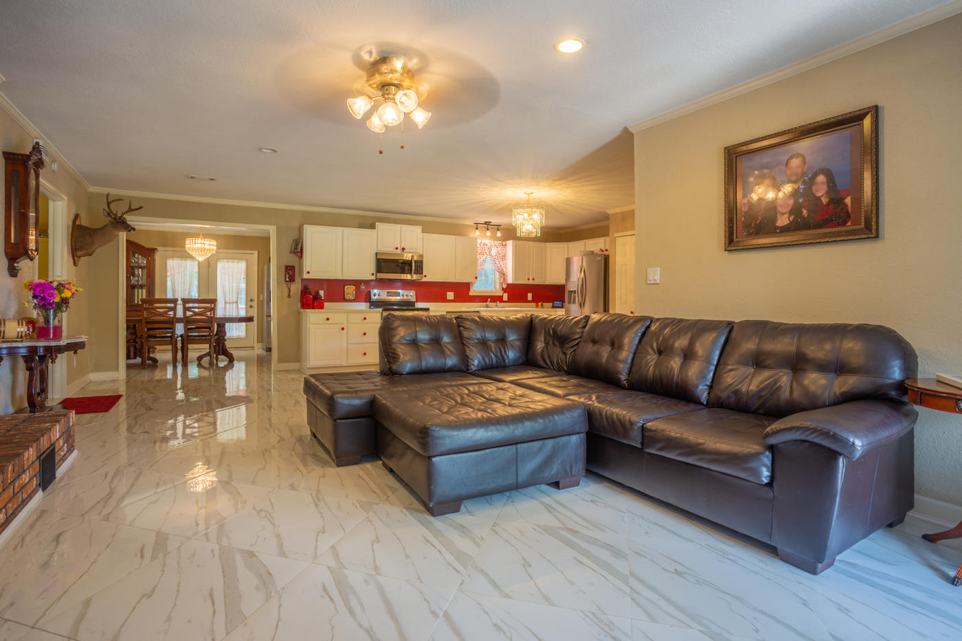 5621 Buckward Road Baker, FL 32531 - Photo 7 of 41 a living room with furniture and wooden floor