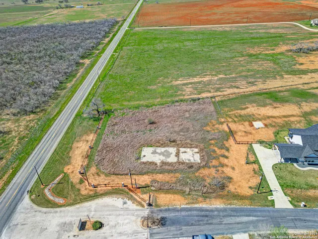 a picture of a bathroom with a shower and a mirror