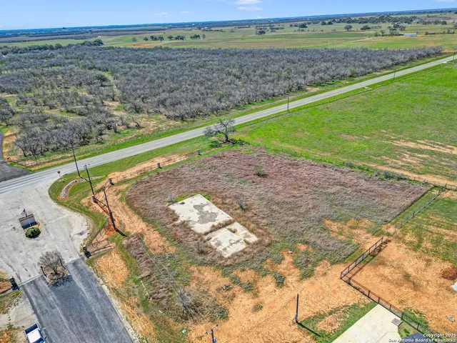 a view of a yard with an outdoor space