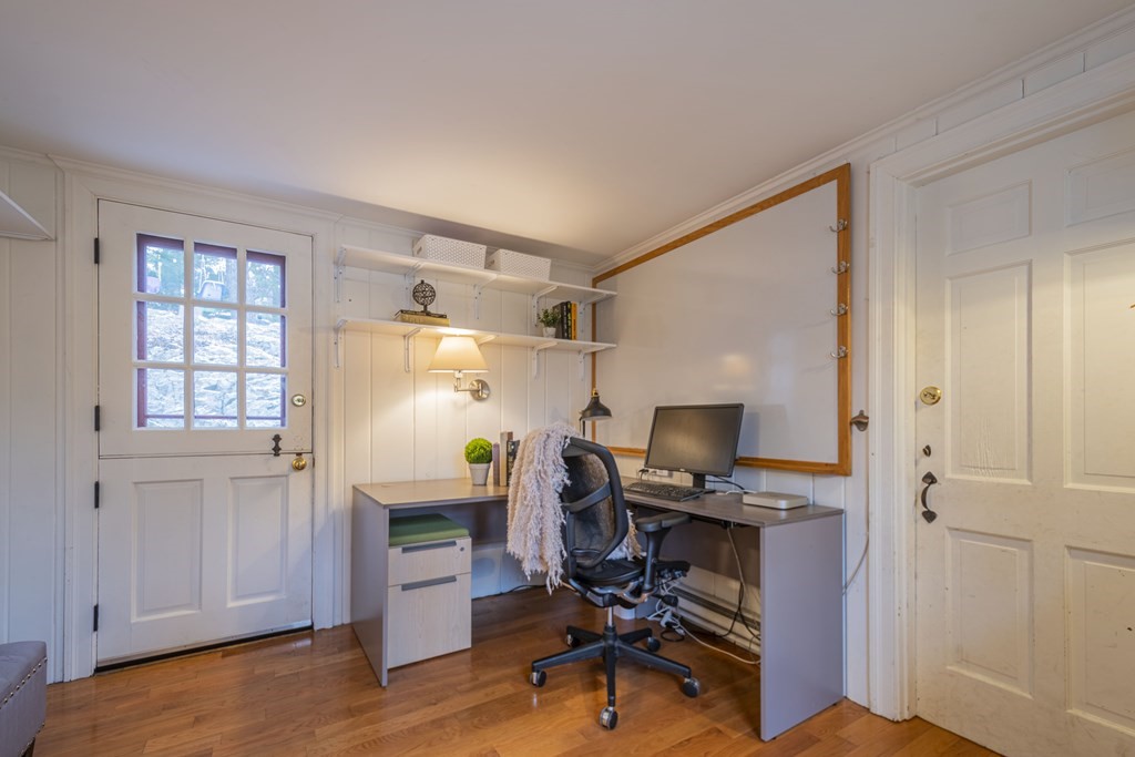 1 Constitution Road Lexington, MA 02421 - Photo 14 of 42 a view of a workspace with furniture and a window