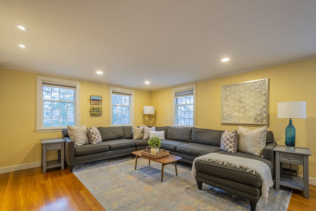 1 Constitution Road Lexington, MA 02421 - Photo 3 of 42 a living room with furniture and a flat screen tv