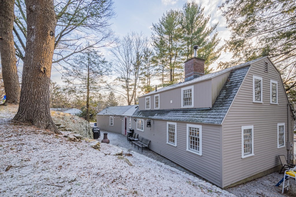 1 Constitution Road Lexington, MA 02421 - Photo 39 of 42 a view of a house with a yard