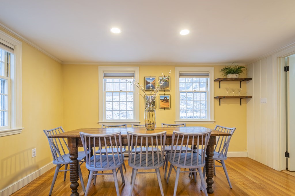 1 Constitution Road Lexington, MA 02421 - Photo 9 of 42 a view of a dining room with furniture and a window