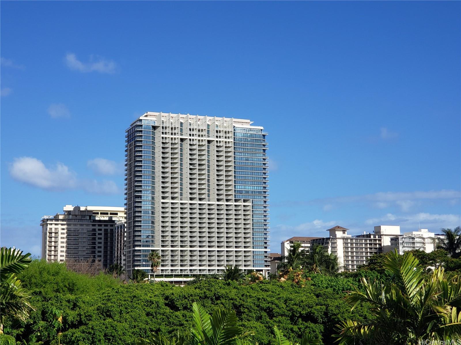 223 Saratoga Road, Unit 2601 Honolulu, HI 96815 - Photo 3 of 23 a view of a building with a garden in the background