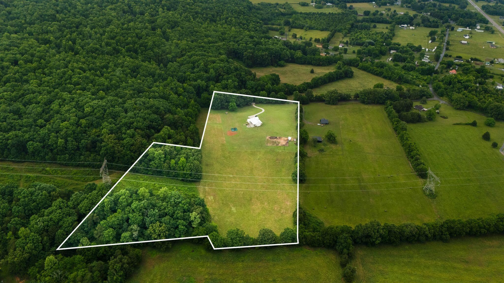 6866 Daus Mountain Road Whitwell, TN 37397 - Photo 2 of 49 a view of a yard with a fountain