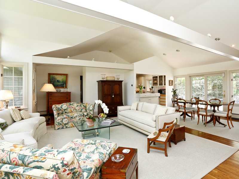 496 Valley Road Cos Cob, CT 06807 - Photo 5 of 14 a living room with furniture and a dining table with wooden floor