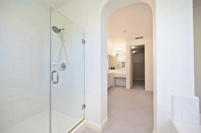 a view of a bathroom with a shower