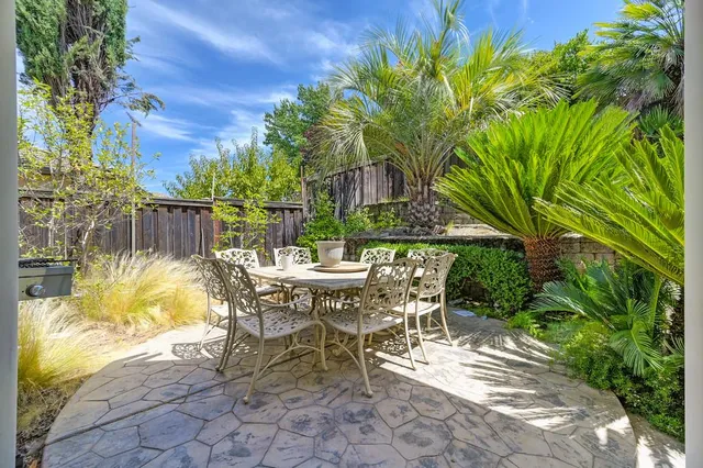 a view of a tables and chairs in patio