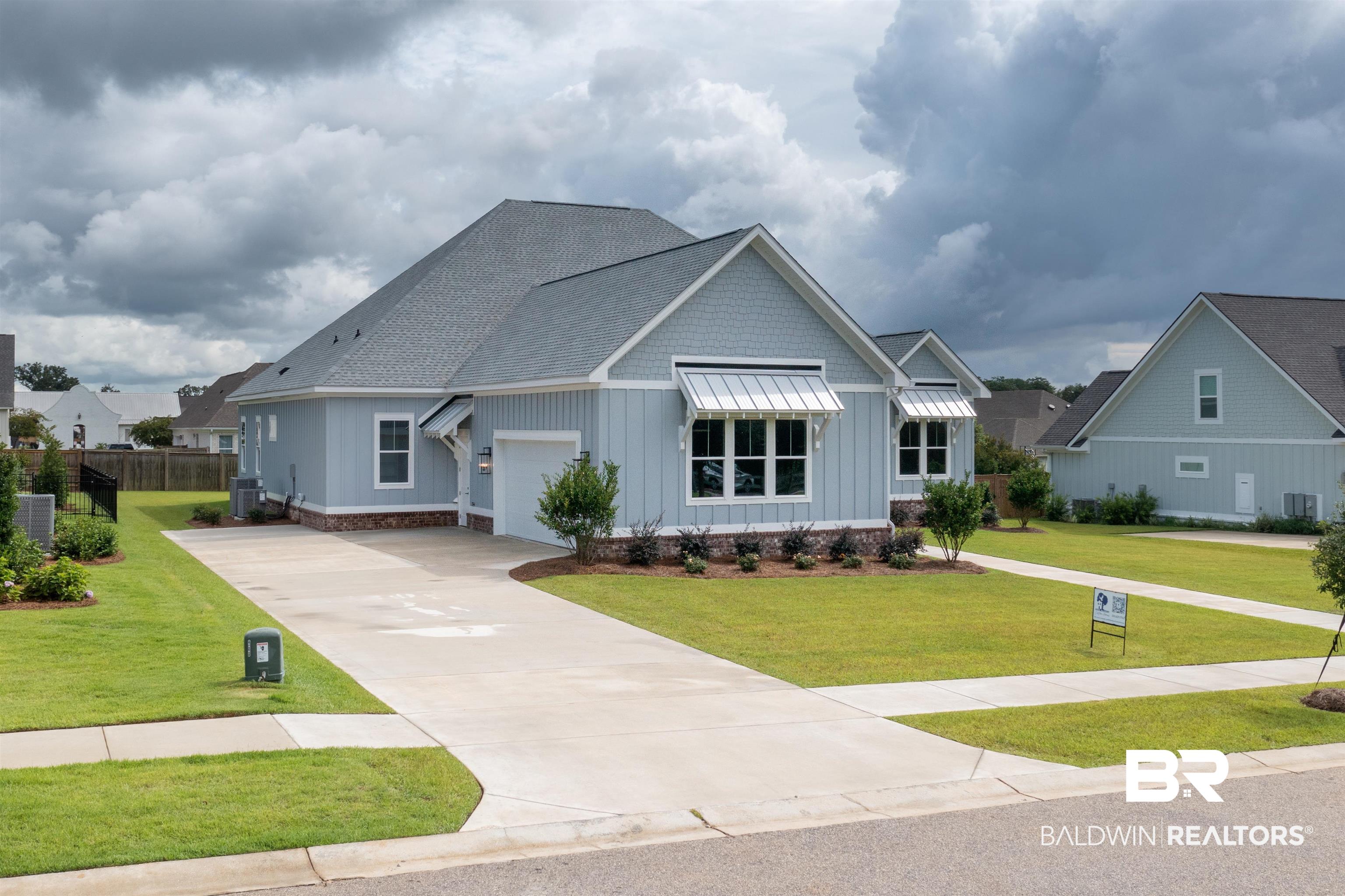 10912 Catania Avenue Fairhope, AL 36532 - Photo 4 of 54 Side view of the home