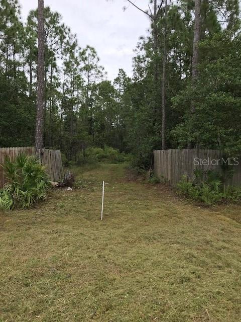 2180 South Us-1 Bunnell, FL 32110 - Photo 2 of 5 a backyard of a house