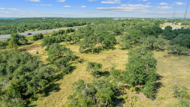 a view of a lake and green space