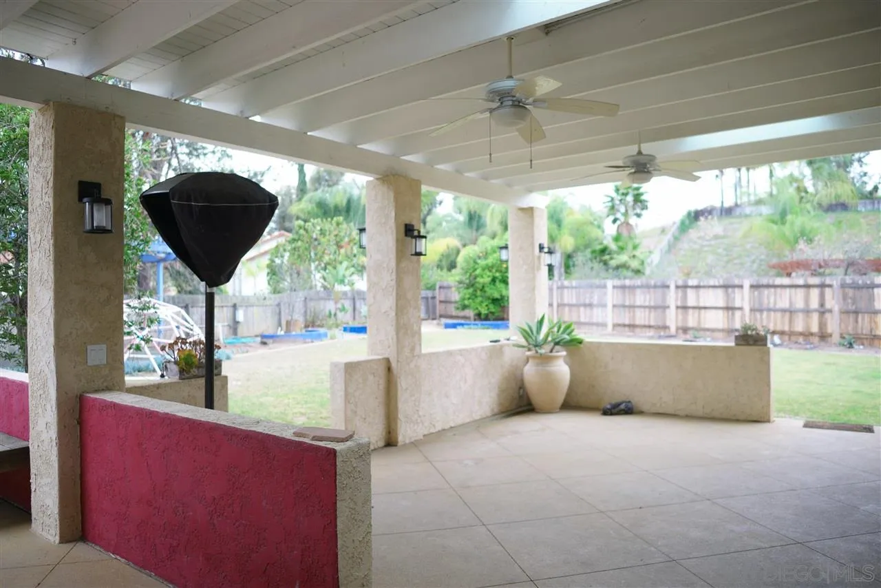 12701 Triumph Drive Poway, CA 92064 - Photo 7 of 21 a living room with furniture and a large window