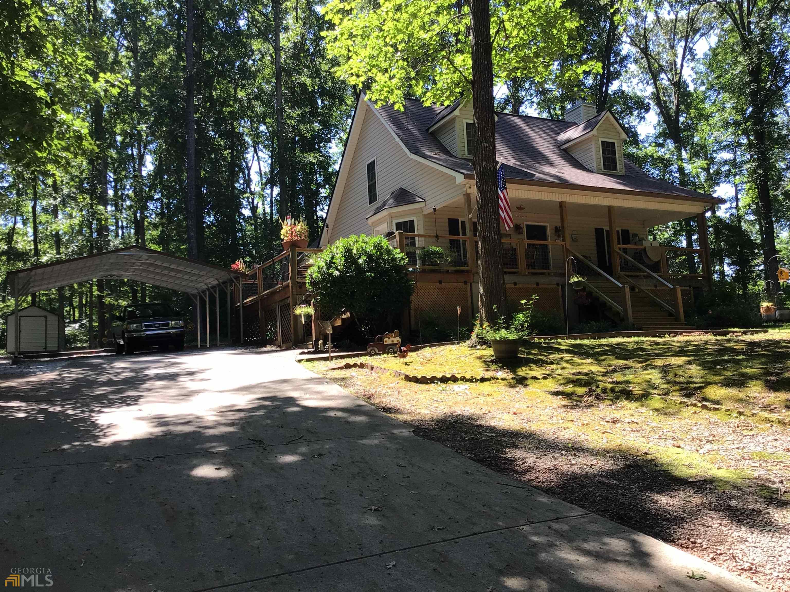248 Maple Ridge Place Colbert, GA 30628 - Photo 1 of 1 a front view of house with yard