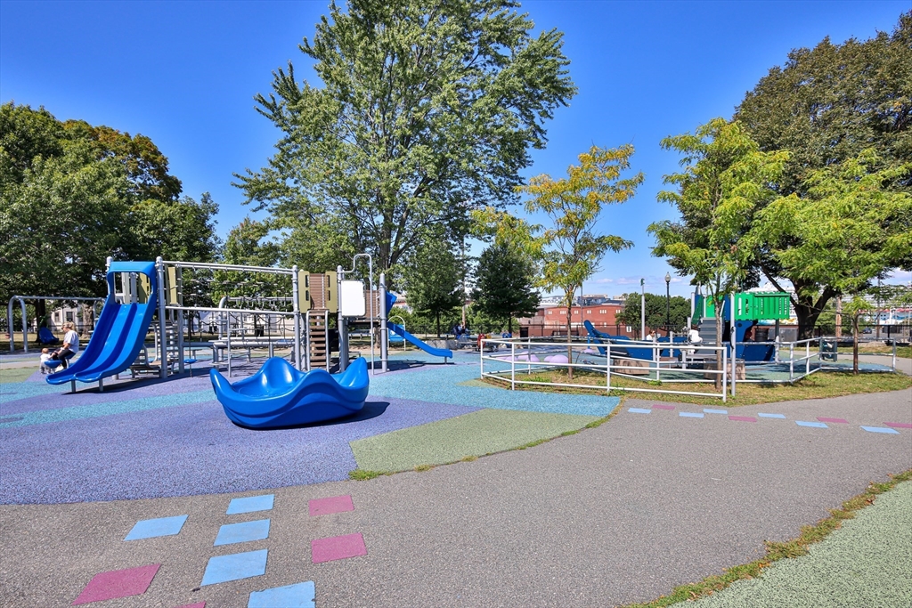 649 East 3rd Street, Unit 2 Boston, MA 02127 - Photo 14 of 16 a view of a swimming pool with a patio and a yard