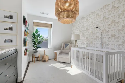 a bath room with a toilet and a shower