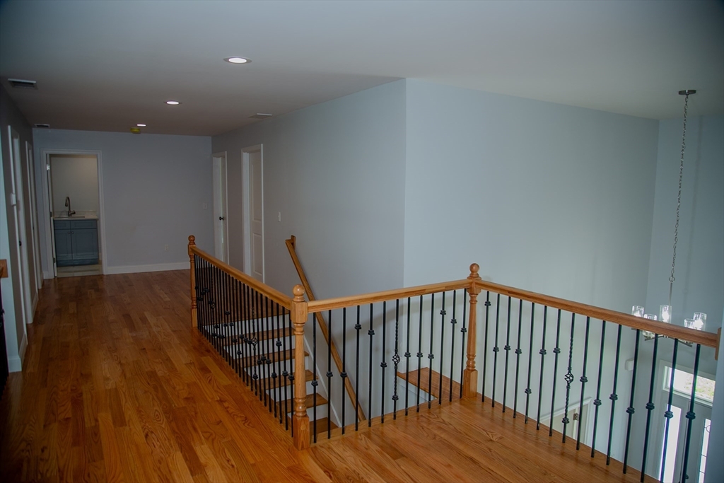 99 West Crystal Brook Drive Springfield, MA 01118 - Photo 22 of 40 a view of hallway with wooden floor