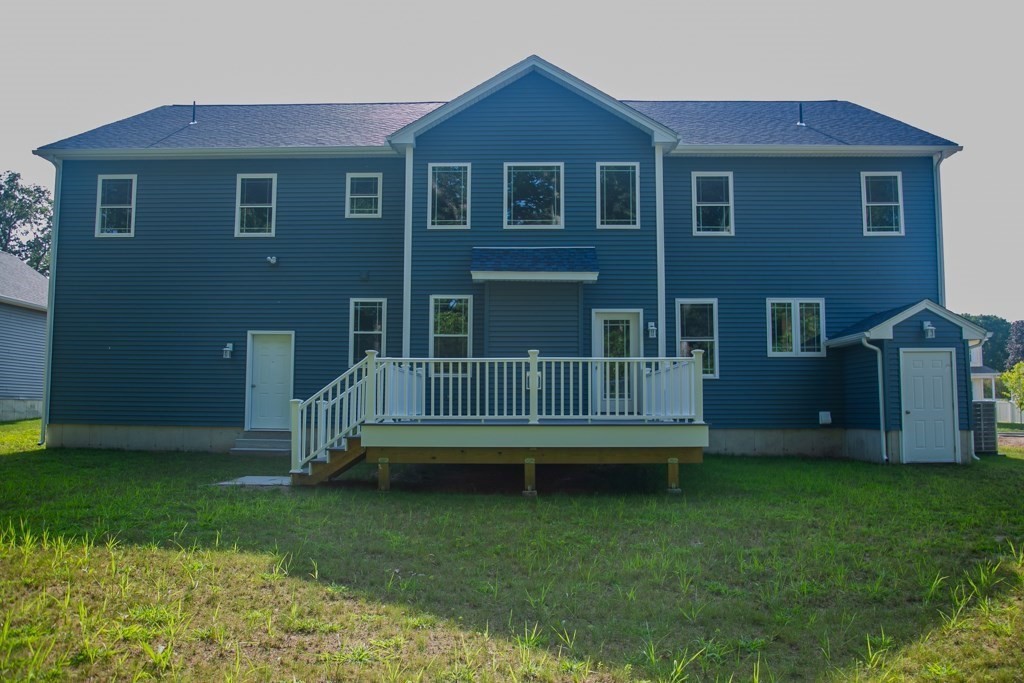 99 West Crystal Brook Drive Springfield, MA 01118 - Photo 39 of 40 a view of house with a yard