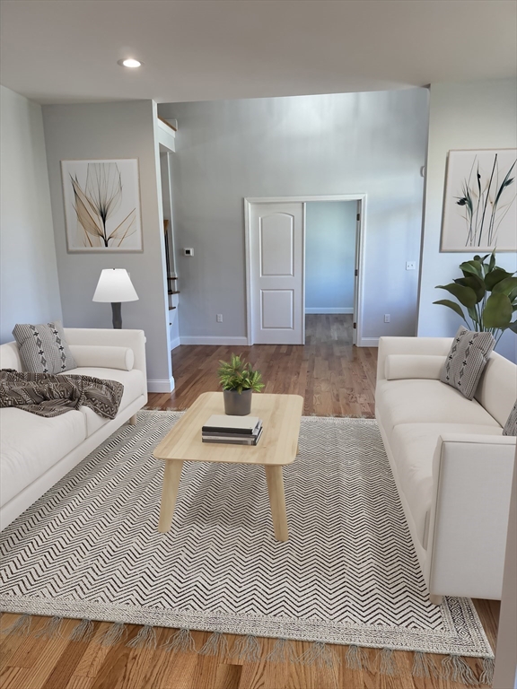 99 West Crystal Brook Drive Springfield, MA 01118 - Photo 5 of 40 a living room with furniture and a table
