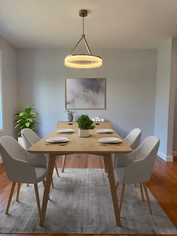 a view of a dining room with furniture