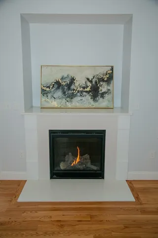 a living room with a fireplace