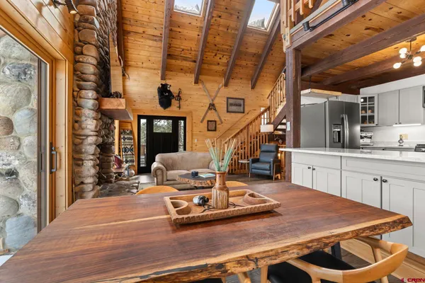 a bedroom with a bed and cabinets