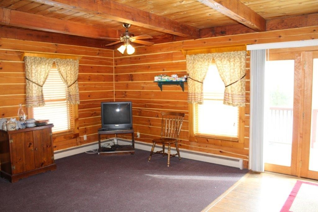 1106 Wauwinet Road Barre, MA 01005 - Photo 9 of 25 a room with furniture and a window