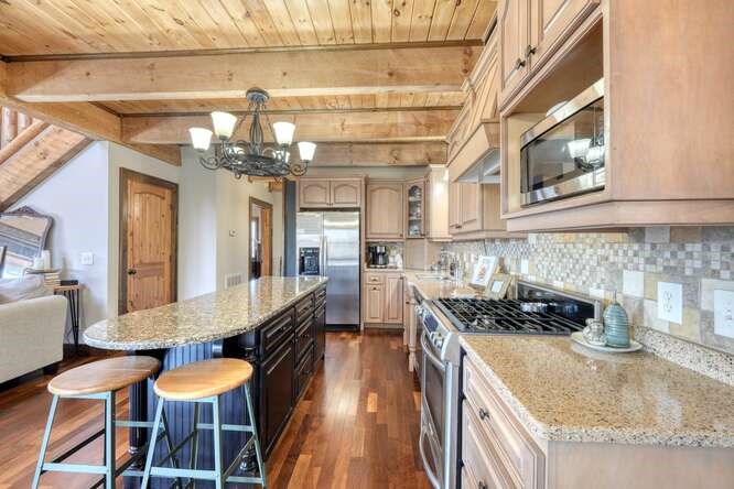 230 Smokin Ridge Hayesville, NC 28904 - Photo 12 of 55 a kitchen with granite countertop lots of counter top space and stainless steel appliances