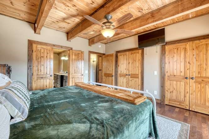 230 Smokin Ridge Hayesville, NC 28904 - Photo 19 of 55 a large bed sitting in a bedroom next to a window