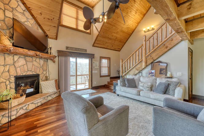 230 Smokin Ridge Hayesville, NC 28904 - Photo 9 of 55 a living room with furniture and a fireplace