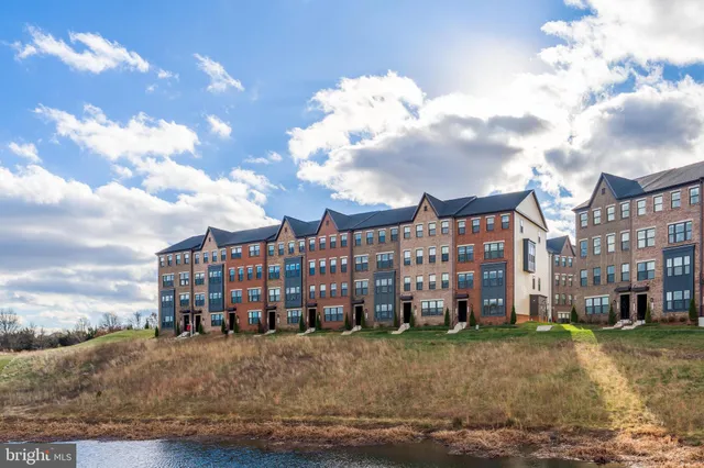 a view of a lake with a houses