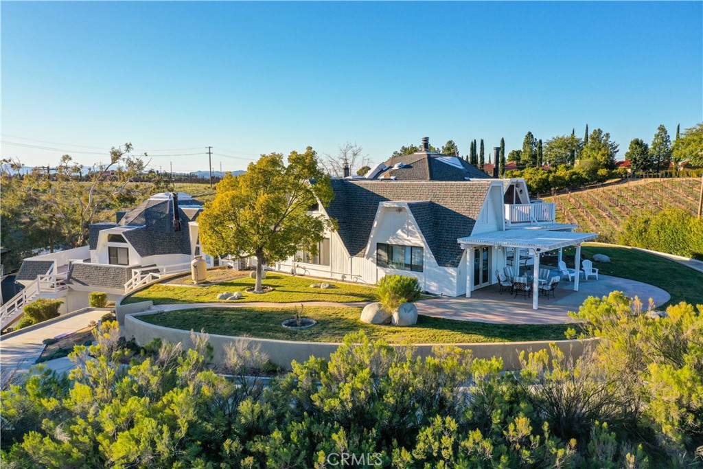 40970 Anza Road Temecula, CA 92592 - Photo 2 of 29 a view of a house with swimming pool yard and outdoor seating