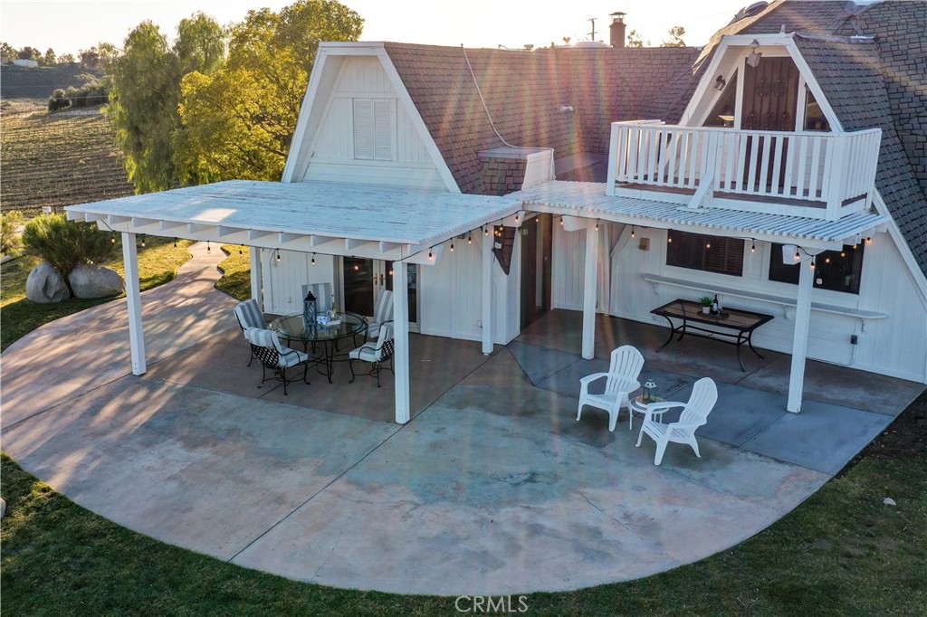 40970 Anza Road Temecula, CA 92592 - Photo 27 of 29 a view of a house with backyard and sitting area