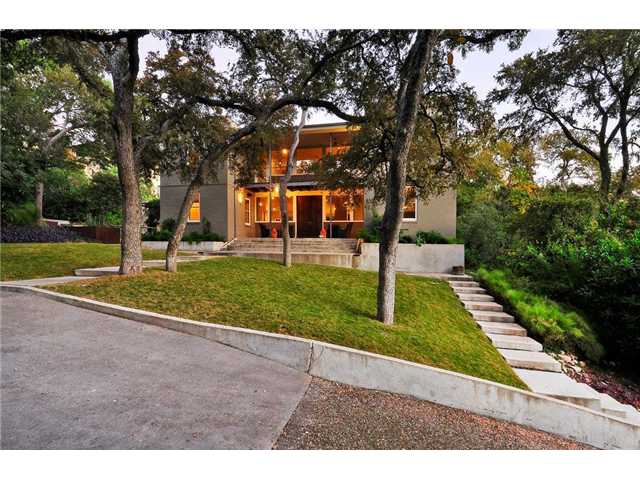 2212 Windsor Road East Austin, TX 78703 - Photo 1 of 1 a view of a yard with plants and trees