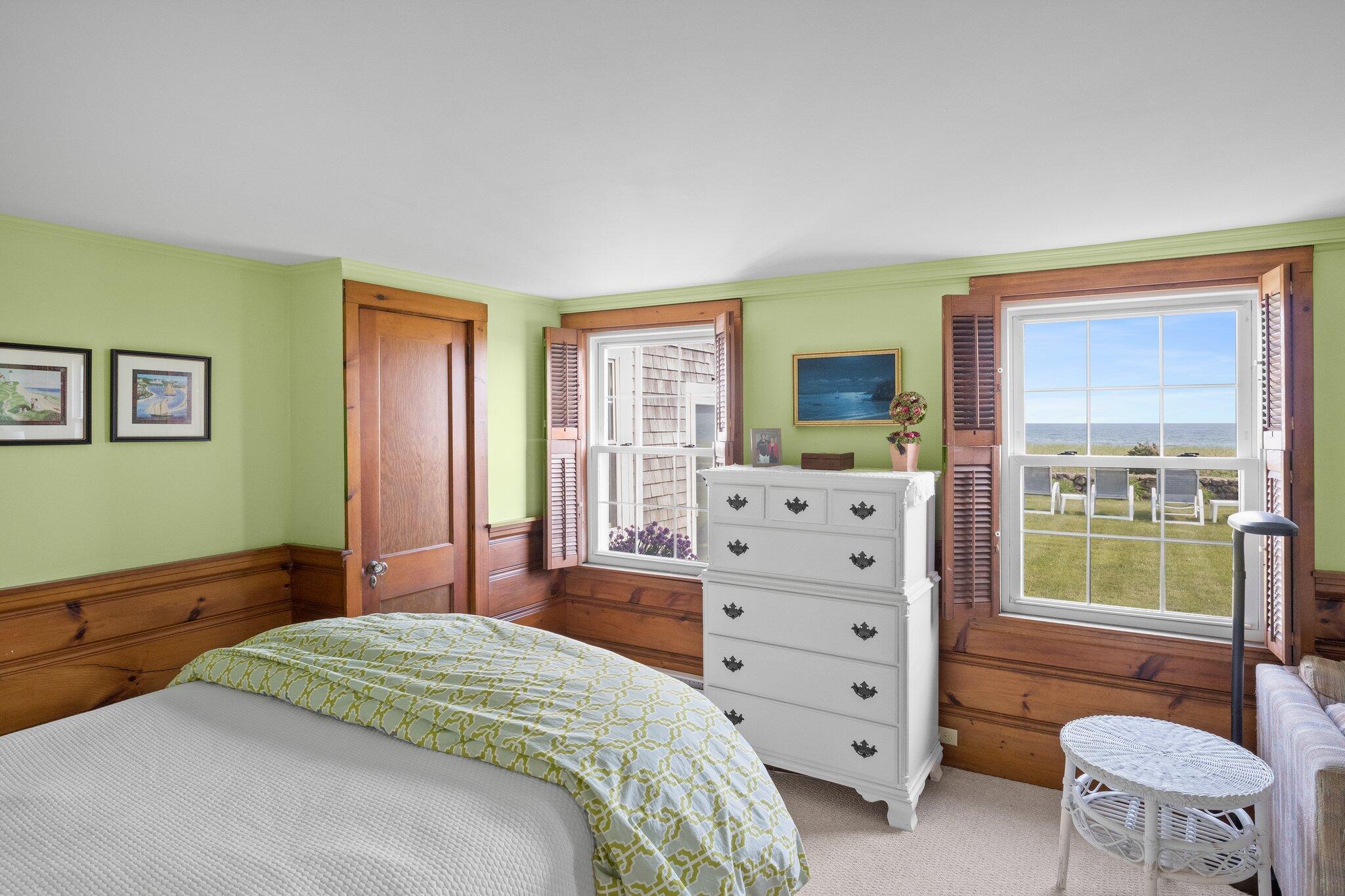 103 Long Beach Road Centerville, MA 02632 - Photo 19 of 36 a bedroom with a bed and a window