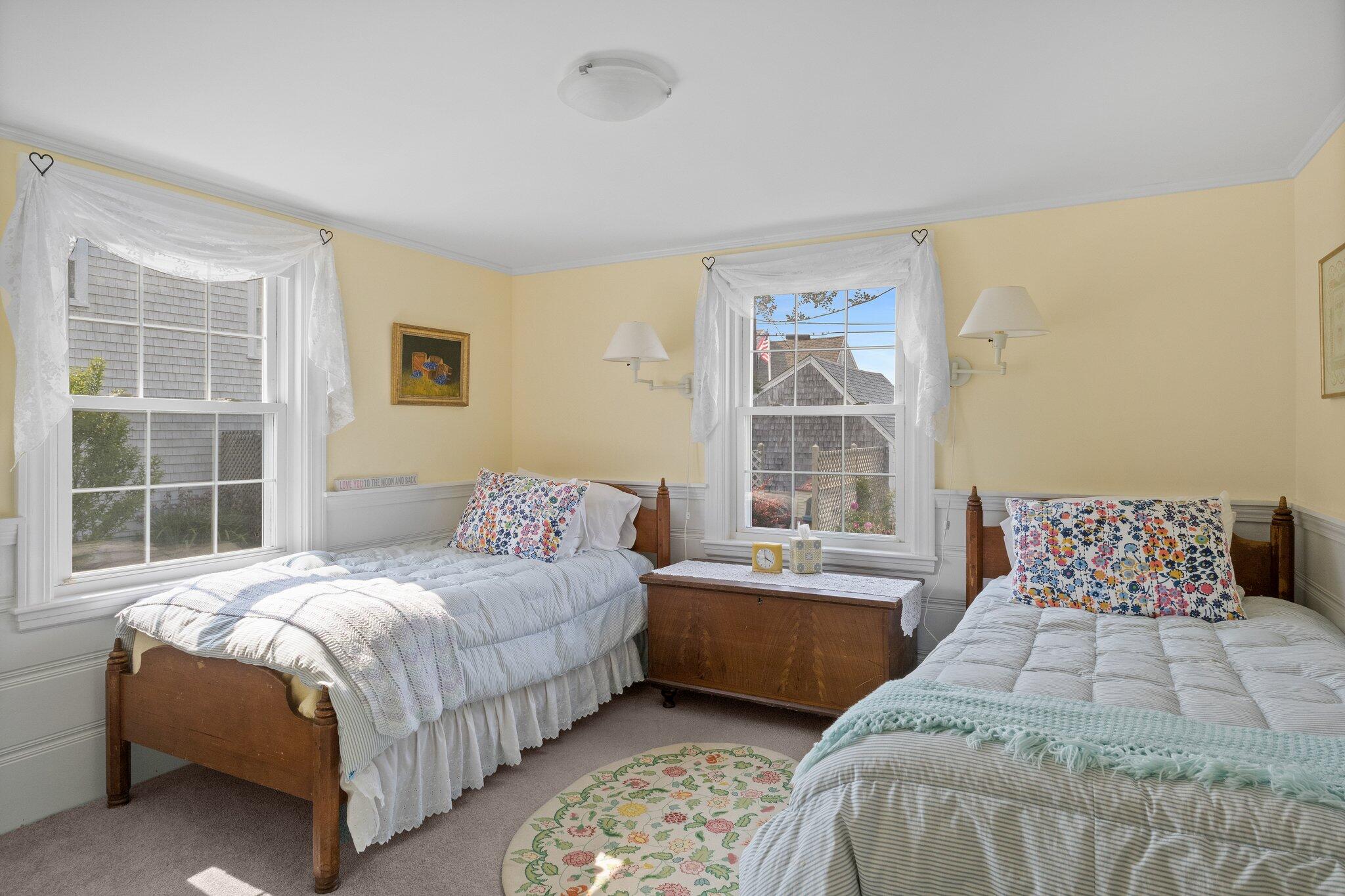 103 Long Beach Road Centerville, MA 02632 - Photo 23 of 36 a bedroom with a bed and a window