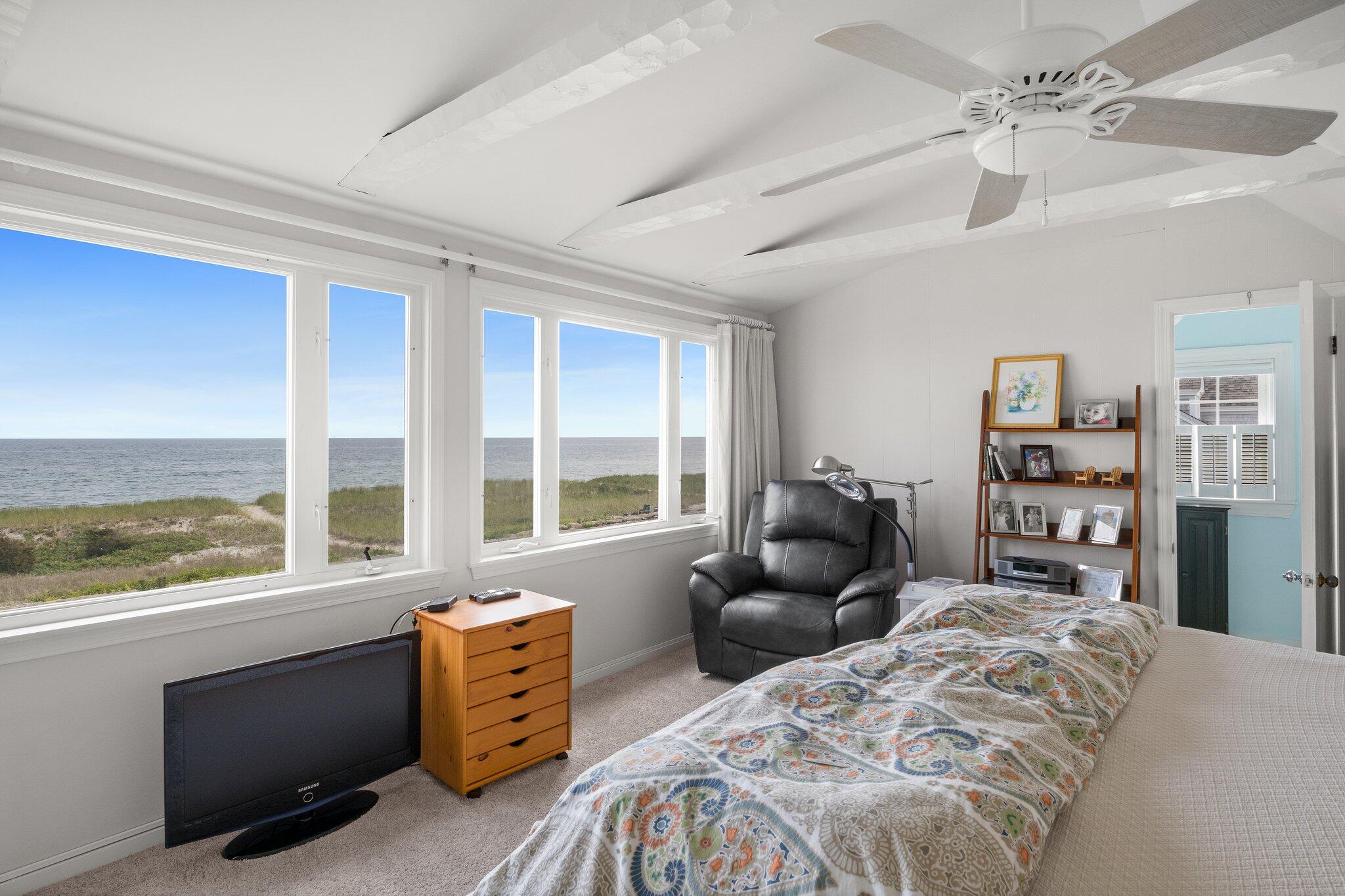 103 Long Beach Road Centerville, MA 02632 - Photo 25 of 36 a bedroom with furniture and a large window