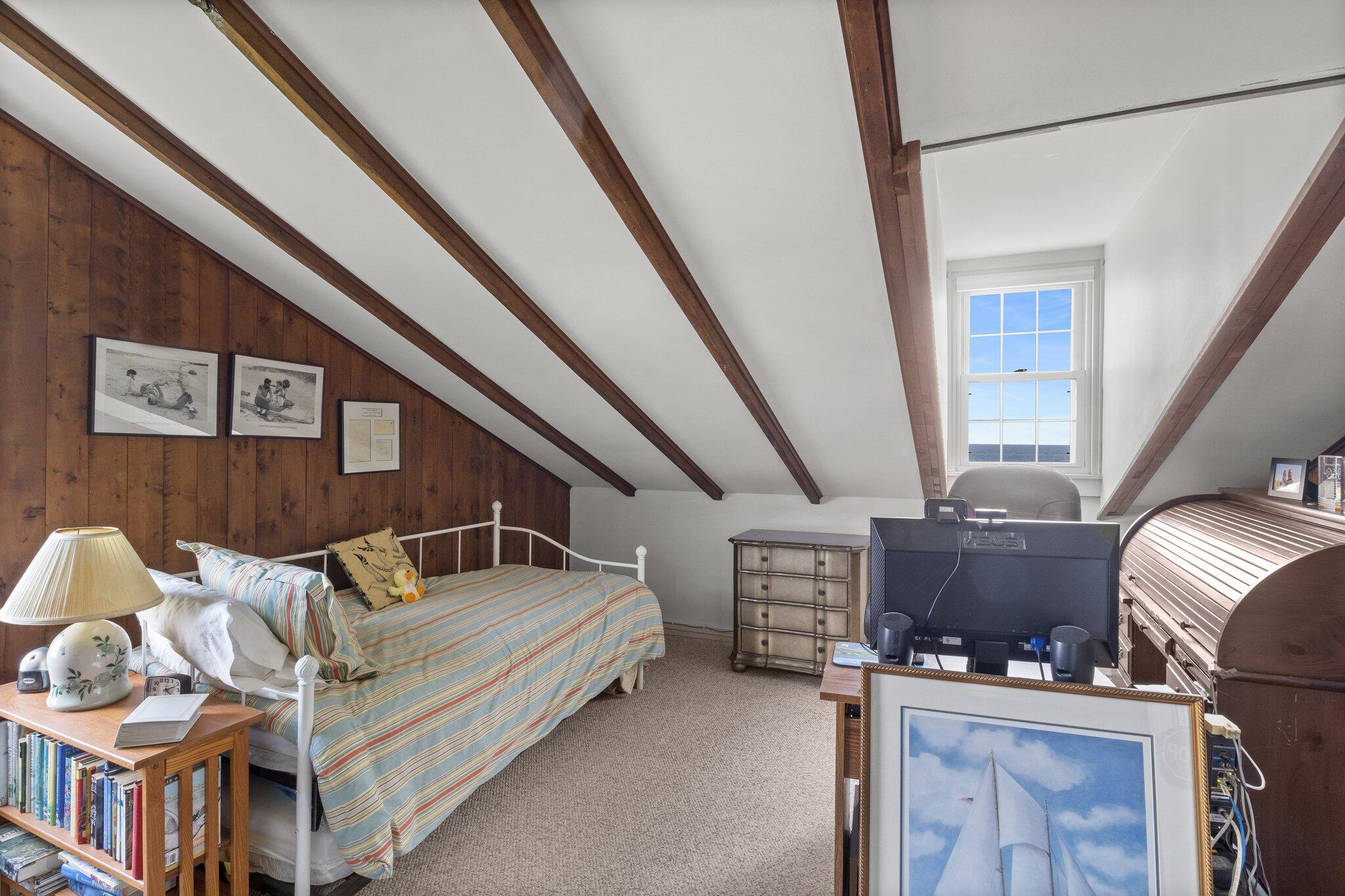 103 Long Beach Road Centerville, MA 02632 - Photo 27 of 36 a bedroom with furniture and a window