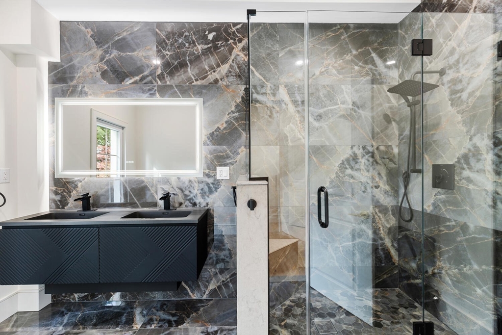 58 Chestnut Street Lynnfield, MA 01940 - Photo 18 of 42 a bathroom with a sink and mirror