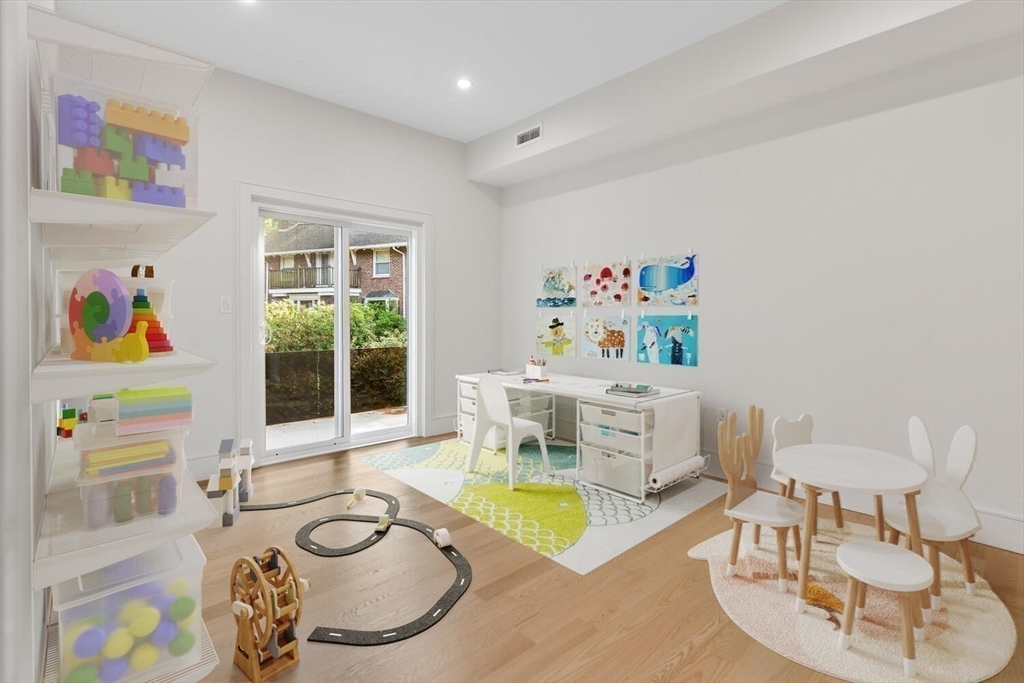 58 Chestnut Street Lynnfield, MA 01940 - Photo 24 of 42 a living room with furniture and a table