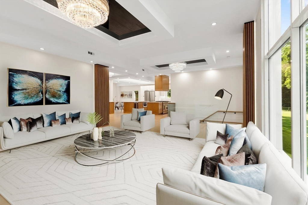 58 Chestnut Street Lynnfield, MA 01940 - Photo 5 of 42 a living room with furniture and a flat screen tv