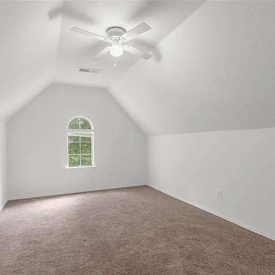1908 Nest Place Plano, TX 75075 - Photo 13 of 14 an empty room with a window and ceiling fan
