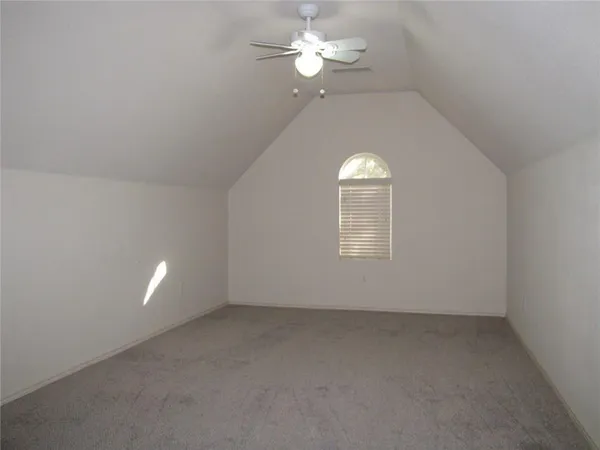 an empty room that has a window