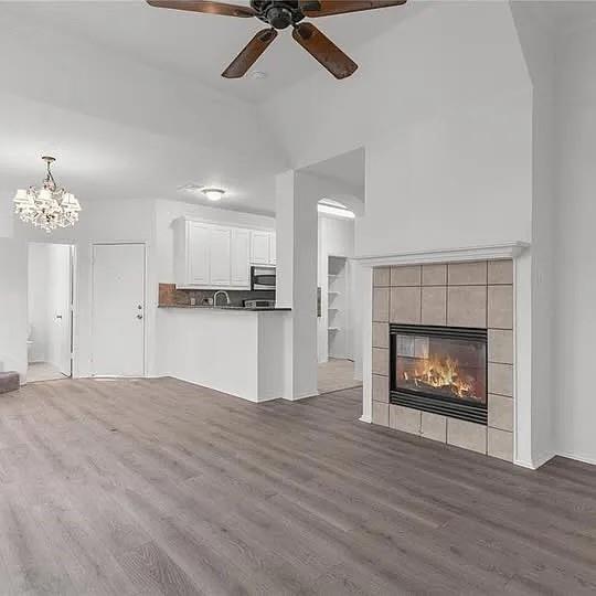 1908 Nest Place Plano, TX 75075 - Photo 5 of 14 a view of an empty room with a fireplace