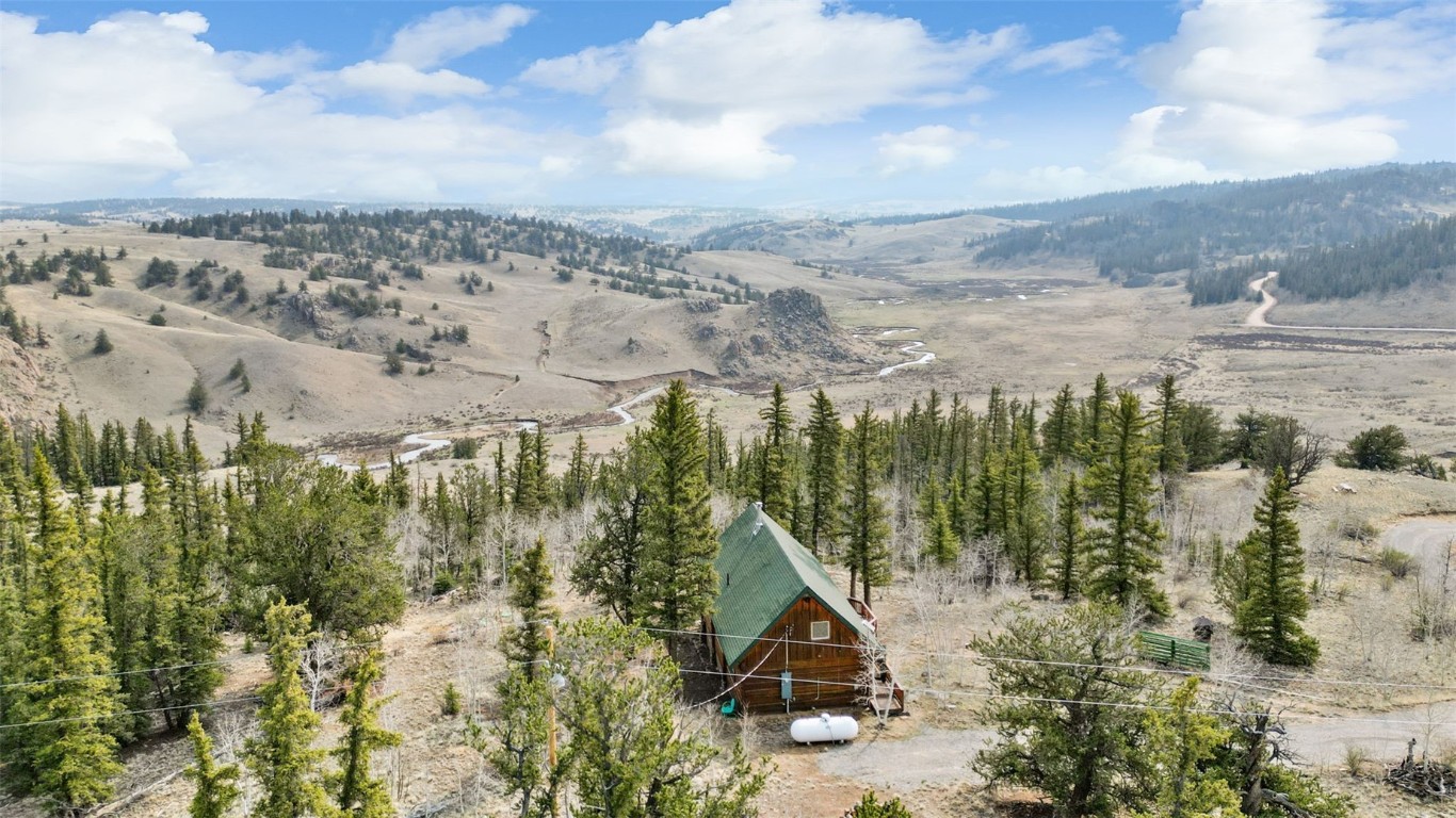 245 Bronco Circle Como, CO 80456 - Photo 12 of 40 a view of a lake with a mountain in the background